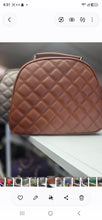 J Quilted handbag