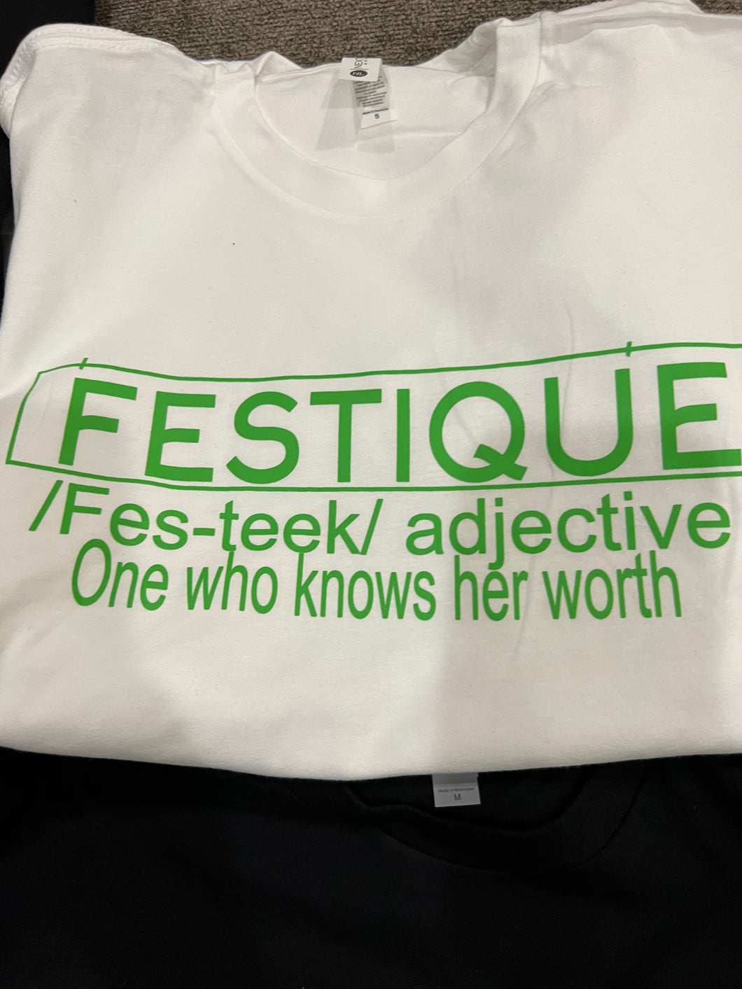 Festique designer definition Tee (worth)